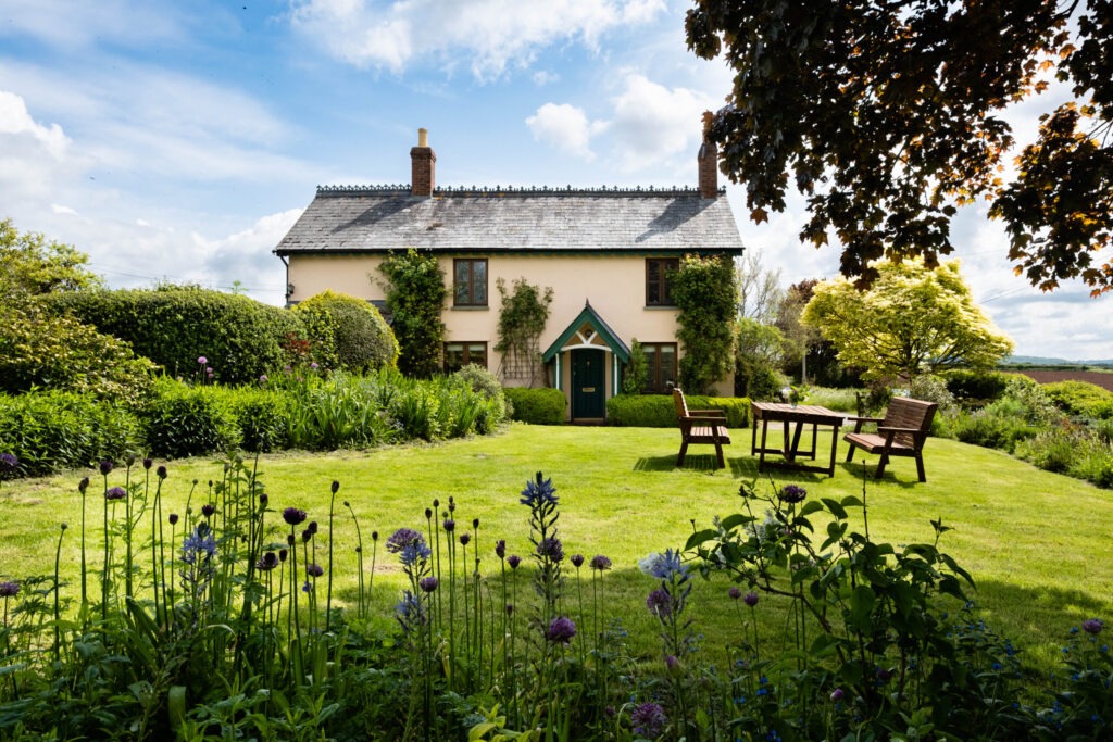 The stone exterior of Field Cottage, a period country house in Peterstow, Herefordshire